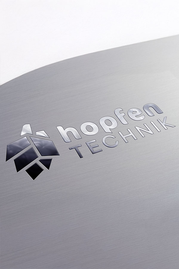 Eine Gravur des Hopfen Technik Logos.